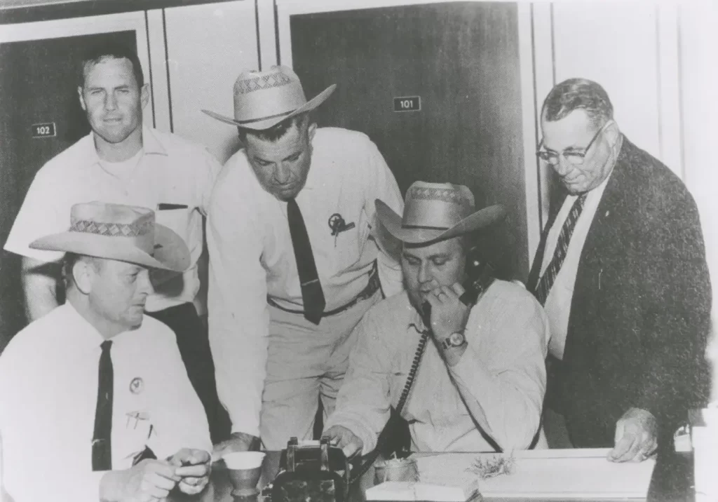 Texas Rangers investigating a murder in Abilene in 1967.