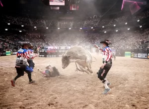 Rodeo clowns move protect dismounted