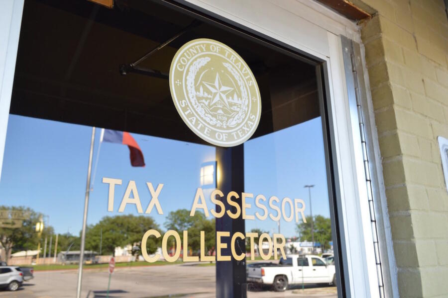 Photo of the door to the Tax Collector-Assessor's Office in Travis County, Texas