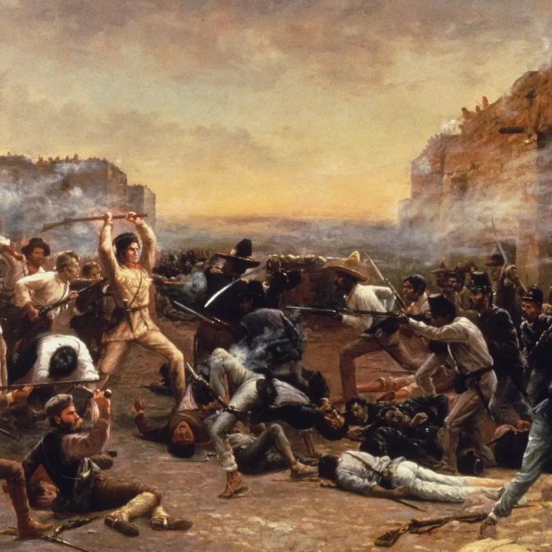 Painting of the Fall of the Alamo, showing Davy Crockett making a last stand alongside other Alamo defenders as the Mexican Army attacks.